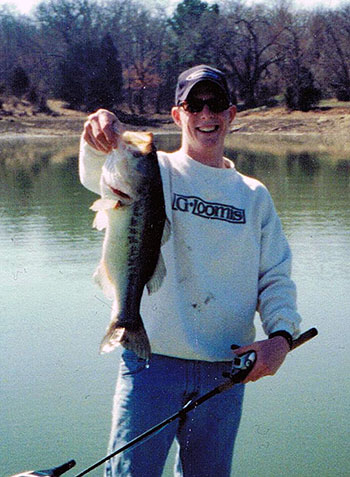 Jack with a big bass, caught as a teen in the 90s